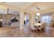 Open concept dining room with adjacent kitchen at 3618 Summerwind Cir, Bradenton, FL 34209