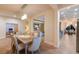 Open concept dining room with adjacent kitchen at 3618 Summerwind Cir, Bradenton, FL 34209