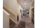 Bright entryway with tile floors, and staircase at 3618 Summerwind Cir, Bradenton, FL 34209