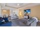 Spacious living room with comfortable sofas and large TV at 3618 Summerwind Cir, Bradenton, FL 34209