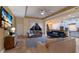 Spacious living room with comfortable seating, large TV, and access to kitchen at 3618 Summerwind Cir, Bradenton, FL 34209