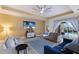 Spacious living room with comfortable seating and a large TV at 3618 Summerwind Cir, Bradenton, FL 34209