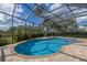 Beautiful screened pool and spa with backyard view at 3618 Summerwind Cir, Bradenton, FL 34209
