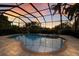Relaxing pool and spa area with a covered lanai at 3618 Summerwind Cir, Bradenton, FL 34209