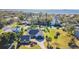 Aerial view of house and neighborhood near the water at 3808 El Conquistador Pkwy, Bradenton, FL 34210