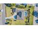 Bird's eye view of house, pool, and driveway at 3808 El Conquistador Pkwy, Bradenton, FL 34210