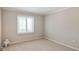 Well-lit bedroom with neutral walls and window shutters at 3808 El Conquistador Pkwy, Bradenton, FL 34210