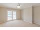Bedroom features double doors opening to pool and patio access at 3808 El Conquistador Pkwy, Bradenton, FL 34210