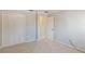 Bedroom with carpet, closet, and access to bathroom at 3808 El Conquistador Pkwy, Bradenton, FL 34210