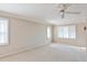 Large bedroom with window shutters and ceiling fan at 3808 El Conquistador Pkwy, Bradenton, FL 34210