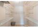 Walk-in closet with wire shelving for ample storage at 3808 El Conquistador Pkwy, Bradenton, FL 34210