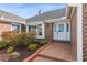Brick front entryway with landscaped walkway at 3808 El Conquistador Pkwy, Bradenton, FL 34210