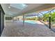 Spacious pool and patio area with screened enclosure at 3911 Torrey Pines Blvd, Sarasota, FL 34238