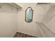 Walk-in closet featuring white walls, shelving, and wood flooring at 3935 Panola Ln # 183, Sarasota, FL 34232
