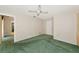 Bright bedroom with a ceiling fan, neutral walls, and ample natural light at 4423 Meadow Creek Cir, Sarasota, FL 34233