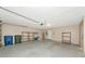 Two car garage that is equipped with shelving for optimal storage space at 4423 Meadow Creek Cir, Sarasota, FL 34233