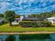 Single story home with a lush backyard and canal view at 4423 Meadow Creek Cir, Sarasota, FL 34233