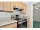 Kitchen featuring updated stainless steel appliances and granite countertops at 4423 Meadow Creek Cir, Sarasota, FL 34233