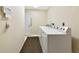 Laundry room with modern washer and dryer units for your convenience at 4423 Meadow Creek Cir, Sarasota, FL 34233