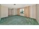 An empty living room with natural light at 4423 Meadow Creek Cir, Sarasota, FL 34233