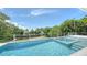 Backyard pool and jacuzzi with waterfront views at 4815 Featherbed Ln, Siesta Key, FL 34242