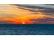 Stunning sunset over the water, casting warm colors across the sky and water at 4822 Ocean Blvd # 8B, Sarasota, FL 34242