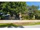 Modern home with fenced yard and lush landscaping at 5311 Creek Dr, Sarasota, FL 34231