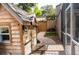 Charming wooden playhouse nestled in the backyard at 5311 Creek Dr, Sarasota, FL 34231