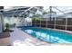 Inviting screened-in pool with plenty of space for lounging at 5311 Creek Dr, Sarasota, FL 34231