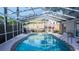 Refreshing screened-in pool and patio area at 5311 Creek Dr, Sarasota, FL 34231