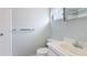 Clean bathroom with toilet, sink, and shower/tub combo at 5474 Riverbluff Cir # V35, Sarasota, FL 34231