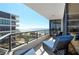 Spacious balcony overlooking the ocean and beach at 575 Sanctuary Dr # A303, Longboat Key, FL 34228