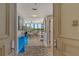 Open and spacious entryway leading into living room at 575 Sanctuary Dr # A303, Longboat Key, FL 34228
