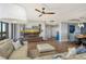 Modern living room with comfortable seating and stylish decor at 575 Sanctuary Dr # A303, Longboat Key, FL 34228