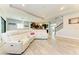 Bright and airy living room, featuring a large sectional sofa at 6108 Champions Row St, Bradenton, FL 34210