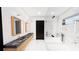 Spa-like bathroom with marble finishes and a large shower at 639 Cornwell On The Gulf, Venice, FL 34285