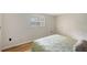 Bedroom with neutral walls and wood-look floors at 640 Venice Ln, Sarasota, FL 34242