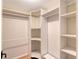 Spacious walk-in closet with shelving and custom storage solutions at 640 Venice Ln, Sarasota, FL 34242