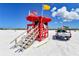 Lifeguard stand on a sunny beach with a lifeguard truck nearby at 640 Venice Ln, Sarasota, FL 34242