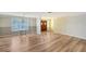 Living room with ample natural light, hardwood floors, and a warm neutral color palette at 640 Venice Ln, Sarasota, FL 34242