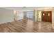 Spacious living room with hardwood floors, natural light, and traditional style at 640 Venice Ln, Sarasota, FL 34242