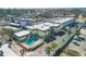 Aerial view of Sea Winds community, pool, and parking at 6703 Midnight Pass Rd # 208, Sarasota, FL 34242