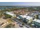 Aerial view of Sea Winds community, including pool at 6703 Midnight Pass Rd # 208, Sarasota, FL 34242