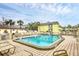Sparkling community pool perfect for relaxation at 6703 Midnight Pass Rd # 208, Sarasota, FL 34242