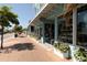 Siesta Key shopping area with various stores and flowers at 6703 Midnight Pass Rd # 208, Sarasota, FL 34242
