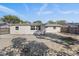 Large backyard with a patio and wooden fence at 7720 Judith Cres, Port Richey, FL 34668