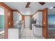 Kitchen boasts granite countertops and white cabinets at 7720 Judith Cres, Port Richey, FL 34668