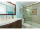 Updated bathroom with a bathtub and stylish fixtures at 8710 Midnight Pass Rd # 205, Sarasota, FL 34242