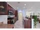 Well-lit kitchen featuring granite countertops, stainless steel appliances, and ample cabinet space at 931 Mangrove Edge Ct, Bradenton, FL 34208