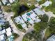 Modern home with private pool and lush landscaping, seen from above at 11213 Veranda Ct, Bradenton, FL 34209